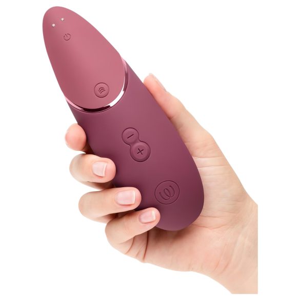 Womanizer Next - oppladbar, luftvibrerende klitorisstimulator (rosa)